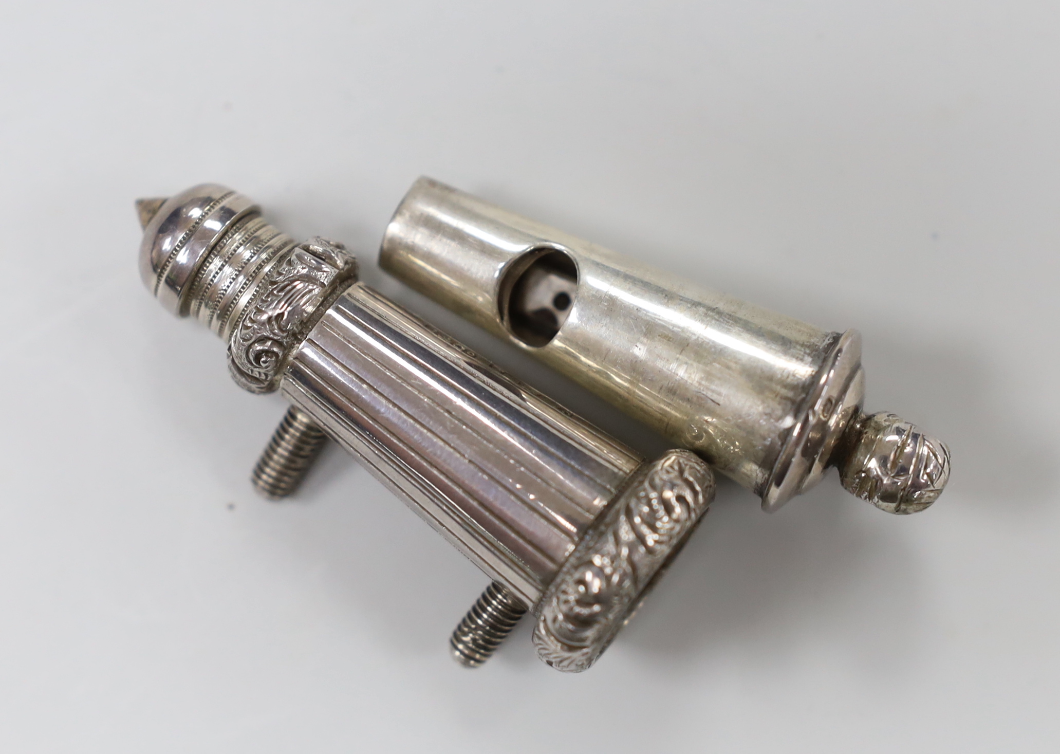 An Edwardian silver military whistle and case, Joseph Jennens & Co, Birmingham, 1902, 68mm.